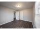 Simple bedroom with hardwood floors and neutral walls at 836 S Tremont St, Indianapolis, IN 46221