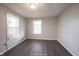Simple bedroom with hardwood floors and neutral walls at 836 S Tremont St, Indianapolis, IN 46221