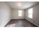 Spacious bedroom with vinyl flooring and neutral walls at 836 S Tremont St, Indianapolis, IN 46221