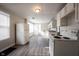 Kitchen features white appliances and vinyl flooring at 836 S Tremont St, Indianapolis, IN 46221
