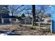 Backyard with chain link fence and mature trees, providing privacy and shade at 901 W Marsh St, Muncie, IN 47303