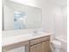 Clean bathroom with light wood vanity and bathtub at 902 Stonehaven Dr, Indianapolis, IN 46239