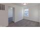 Bright bedroom with large window and access to another room at 902 Stonehaven Dr, Indianapolis, IN 46239