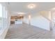 Open concept kitchen with island and stainless steel appliances at 902 Stonehaven Dr, Indianapolis, IN 46239