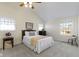 Bright bedroom with vaulted ceiling, carpet, and ample natural light at 934 Farmview Ln, Carmel, IN 46032