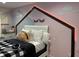 Cozy bedroom with unique wall decor and a comfortable bed at 9426 Orchard Cove Dr, Indianapolis, IN 46239
