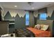 Serene bedroom featuring mountain-themed wall paint and a plush bed at 9426 Orchard Cove Dr, Indianapolis, IN 46239