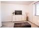 Bedroom with a TV, media console, and comfortable seating area at 965 Driftwood Ave, Columbus, IN 47203