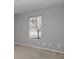 Simple bedroom with neutral gray walls, carpeting and a window at 10391 Butler Dr, Brownsburg, IN 46112