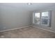 Well-lit bedroom with neutral walls and carpet at 10391 Butler Dr, Brownsburg, IN 46112