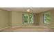 Inviting bedroom with two large windows and ceiling fan at 10391 Butler Dr, Brownsburg, IN 46112