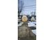 Large backyard with two sheds and a paved patio at 11 Eastridge Dr, Greenwood, IN 46143