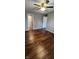 Large bedroom with dark hardwood floors and ceiling fan at 11 Eastridge Dr, Greenwood, IN 46143