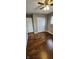 Bedroom featuring hardwood floors, ceiling fan, and double closet at 11 Eastridge Dr, Greenwood, IN 46143