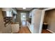 Modern kitchen with white cabinets, wood countertops, and stainless steel appliances at 11 Eastridge Dr, Greenwood, IN 46143
