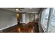 Spacious living room with dark hardwood floors and neutral walls at 11 Eastridge Dr, Greenwood, IN 46143