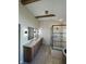 Elegant bathroom featuring double sinks, granite countertops, and a modern glass shower with white brick surround at 11253 Loch Raven Blvd, Fishers, IN 46037
