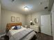 Cozy bedroom with neutral tones, comfortable furnishings, and ample natural light for a serene retreat at 11253 Loch Raven Blvd, Fishers, IN 46037