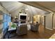 Inviting living room with modern decor, fireplace, and wood floors at 11253 Loch Raven Blvd, Fishers, IN 46037