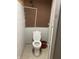Unfinished basement bathroom with toilet and pegboard wall at 116 Kenova Dr, Indianapolis, IN 46227