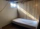 Finished basement bedroom with a twin bed at 116 Kenova Dr, Indianapolis, IN 46227