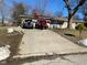 Ranch house with attached garage and driveway at 116 Kenova Dr, Indianapolis, IN 46227