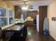 Eat-in kitchen with wood cabinets and a large window at 116 Kenova Dr, Indianapolis, IN 46227