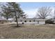 Ranch home with a large backyard and mature tree at 1238 Orchard N Park, Carmel, IN 46280