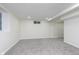 Large finished basement area with neutral carpeting at 1238 Orchard N Park, Carmel, IN 46280