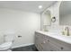 Modern bathroom with double vanity and patterned wall at 1238 Orchard N Park, Carmel, IN 46280