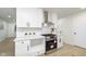 Bright kitchen featuring white shaker cabinets, stainless steel appliances, and a gas cooktop at 1238 Orchard N Park, Carmel, IN 46280
