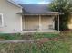 Small covered porch with table and chairs at 12625 Strawtown Ave, Noblesville, IN 46060