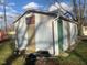 Detached garage with green door at 12625 Strawtown Ave, Noblesville, IN 46060