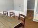 Rustic kitchen island with three chairs at 12625 Strawtown Ave, Noblesville, IN 46060