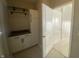Laundry room with white cabinets and patterned tile floor at 17389 Dallington St, Westfield, IN 46074