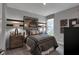 Cozy bedroom with gray bedding and decor at 19509 Mcbee Ave, Westfield, IN 46074