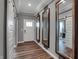 Bright and spacious entryway with wood-look floors and barn doors at 19509 Mcbee Ave, Westfield, IN 46074
