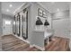 Stylish entryway with built-in bench seating and large mirrors at 19509 Mcbee Ave, Westfield, IN 46074