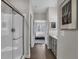 Modern bathroom with a walk-in shower and grey vanity at 196 Brunson St, Westfield, IN 46074