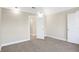 Spacious bedroom with carpet and an open door to a closet at 2215 Brookside Ave, Indianapolis, IN 46218