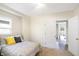 Bright bedroom with double bed and access to another room at 2215 Brookside Ave, Indianapolis, IN 46218