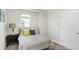 Cozy bedroom featuring a bed with yellow and gray pillows at 2215 Brookside Ave, Indianapolis, IN 46218