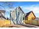Rear view of a charming house with a fenced yard at 2215 Brookside Ave, Indianapolis, IN 46218