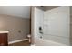 Updated bathroom with tub, shower, and vanity at 2502 N Harding N St, Indianapolis, IN 46208