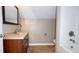 Bathroom features a vanity and a tub shower combo at 2502 N Harding N St, Indianapolis, IN 46208