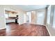 Hardwood floor living room, open concept to kitchen and staircase at 2502 N Harding N St, Indianapolis, IN 46208