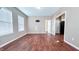 Spacious living room with hardwood floors and an open floor plan at 2502 N Harding N St, Indianapolis, IN 46208