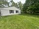 Large backyard with lush green grass at 2533 Aurie Dr, Indianapolis, IN 46219