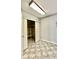 Clean and bright basement with tiled floor and ample shelving at 2533 Aurie Dr, Indianapolis, IN 46219