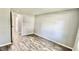 Bedroom with hardwood floors and access to bathroom at 2533 Aurie Dr, Indianapolis, IN 46219